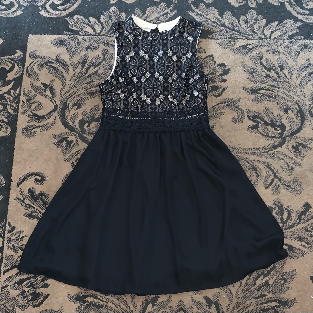 Francesca’s black dress
